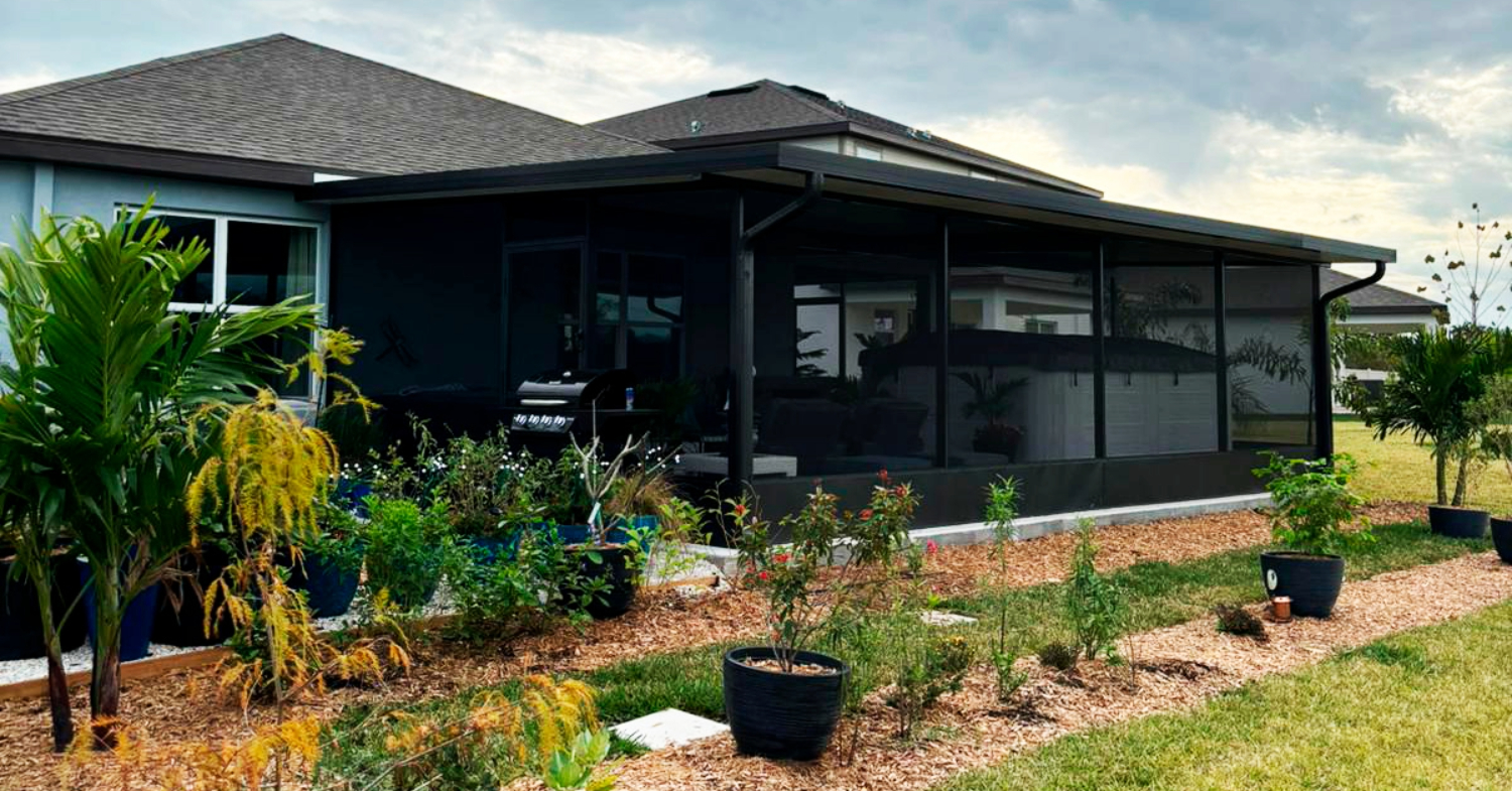 A luxury outdoor living space with comfortable seating and pool access, highlighting the differences of lanai vs screened porch.