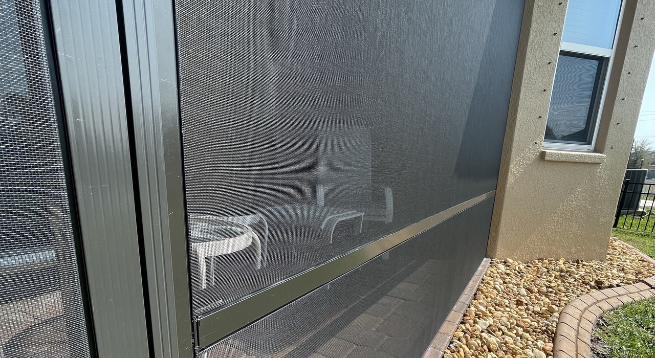Detailed close-up of tight-weave mesh comparing aluminum vs fiberglass screen texture